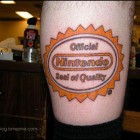 cool nintendo tattoo logo 140x140 Russian Nesting Dolls, PS3 Controller Paperclips, Nintendo Logo Tattoos [Random Roundup]