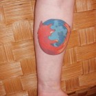 firefox logo tattoo 140x140 Russian Nesting Dolls, PS3 Controller Paperclips, Nintendo Logo Tattoos [Random Roundup]