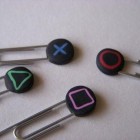 ps3 controller buttons paperclips 140x140 Russian Nesting Dolls, PS3 Controller Paperclips, Nintendo Logo Tattoos [Random Roundup]