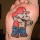 super mario brothers feet tattoo 140x140 Super Mario Tattoos, Disease Plush Toys, iPhone Virus Solution [Walyou Roundup]
