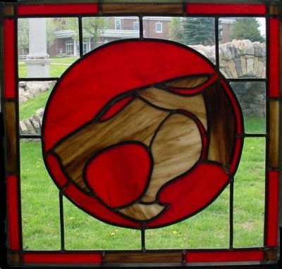 thundercatsstainedglass1 Thundercats are Loose in This Stained Glass Artwork and Wood Carving