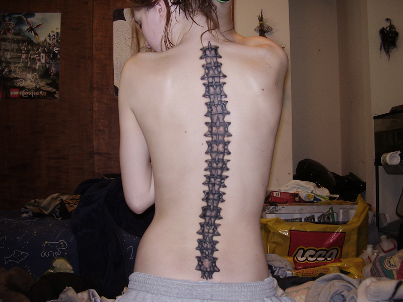 This spine tattoo is not only a nice example of novel tattoos, 